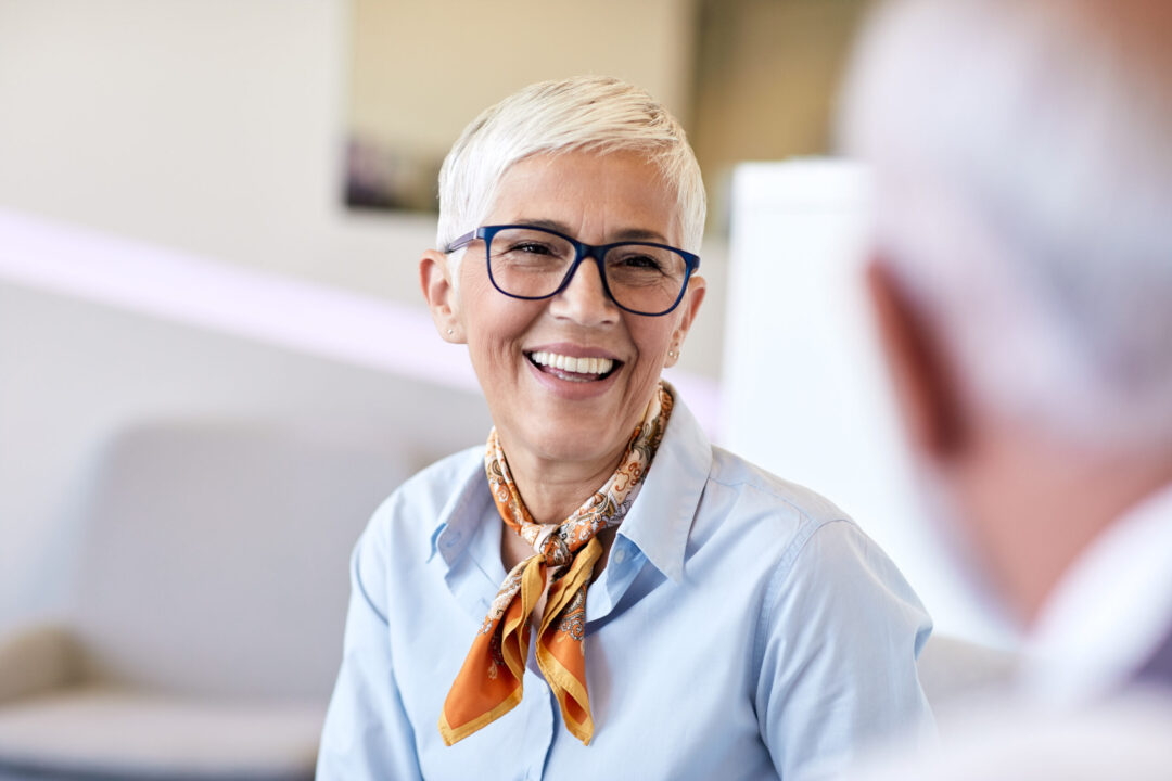Portrait of two senior business people talking in the office